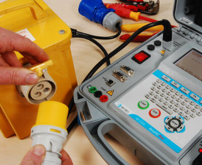 hands-on training demonstrating a test on a 110V transformer