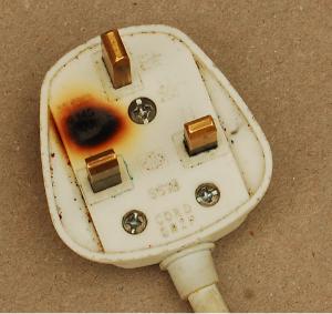 scorched plug due around fuse holder