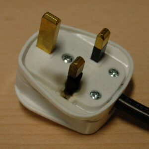 Damaged plug caused by overheated fuse