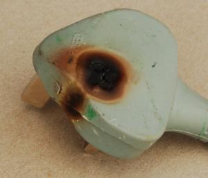 moulded plug with heat damage