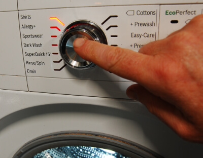 washing machine with electronic switch